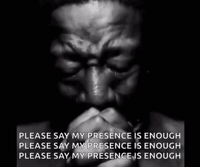 A Black And White Photo Of A Man Praying With His Hands Folded And A Quote . GIF