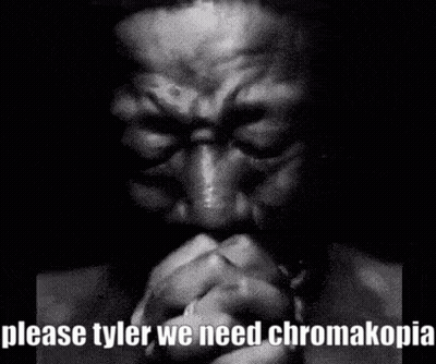 A Black And White Photo Of A Man Praying With His Hands Folded In Front Of His Face . GIF