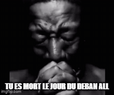 A Black And White Photo Of A Man Praying With The Words Tu Es Mort Le Jour Du Deban All Below Him GIF