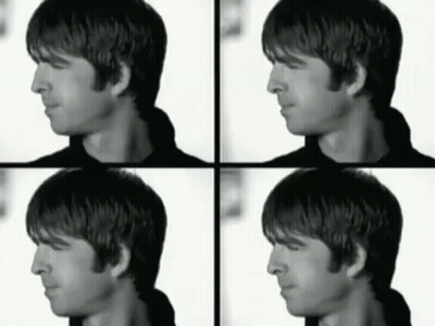A Black And White Photo Of A Man 'S Face And Neck GIF