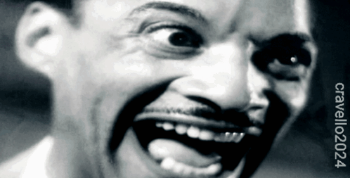 A Black And White Photo Of A Man 'S Face With A Caption That Says ' Cravello024 ' GIF