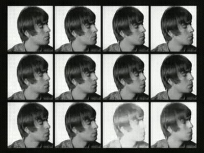 A Black And White Photo Of A Man 'S Face With Different Shades Of Hair GIF
