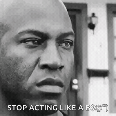 A Black And White Photo Of A Man 'S Face With The Caption `` Stop Acting Like A B $ @ ! '' GIF
