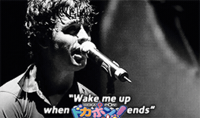 A Black And White Photo Of A Man Singing Into A Microphone With The Words Wake Me Up When I Doka Poni Ends GIF