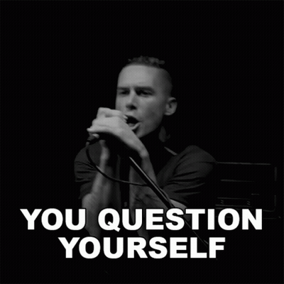 A Black And White Photo Of A Man Singing Into A Microphone With The Words You Question Yourself Below Him GIF