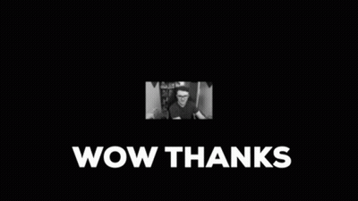 A Black And White Photo Of A Man Sitting In Front Of A Computer And The Words Wow Thanks . GIF