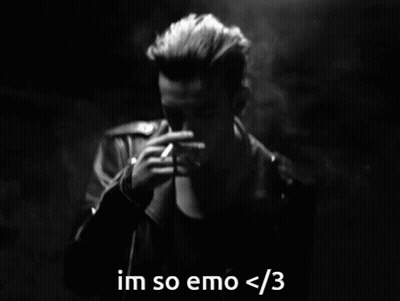 A Black And White Photo Of A Man Smoking A Cigarette With The Caption Im So Emo < 3 GIF