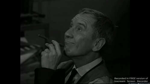 A Black And White Photo Of A Man Smoking A Pipe With The Words Recorded In Free Version Of Icecream Screen Recorder Belo GIF