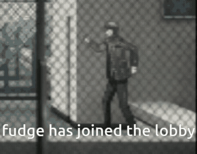 A Black And White Photo Of A Man Standing In Front Of A Chain Link Fence With The Caption Fudge Has Joined The Lobby . GIF
