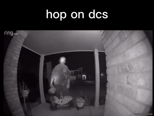 A Black And White Photo Of A Man Standing On A Porch With The Caption Hop On Dcs GIF