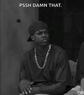 A Black And White Photo Of A Man Wearing A Baseball Cap And A Chain . GIF