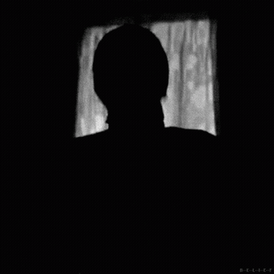A Black And White Photo Of A Man Wearing A Mask With The Letters B-E-L-I-E-F Below Him GIF