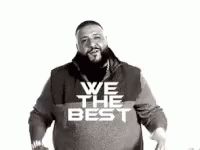 A Black And White Photo Of A Man Wearing A Sweater That Says We The Best . GIF