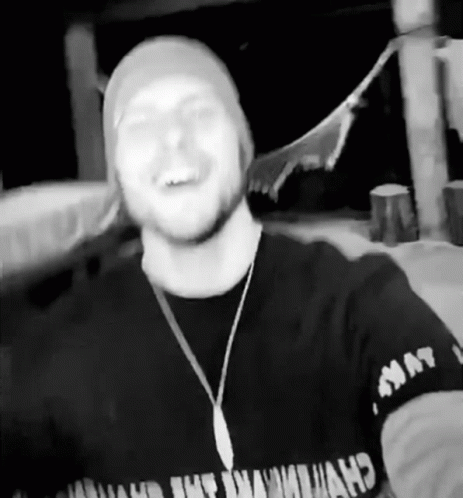 Black And White Photo Of Man With Army T-Shirt GIF