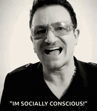 A Black And White Photo Of A Man Wearing Sunglasses . GIF