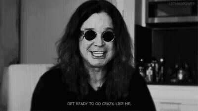 A Black And White Photo Of A Man Wearing Sunglasses GIF