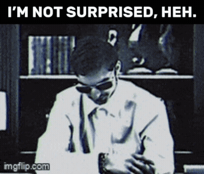 A Black And White Photo Of A Man Wearing Sunglasses With The Caption " I 'M Not Surprised , Heh " GIF