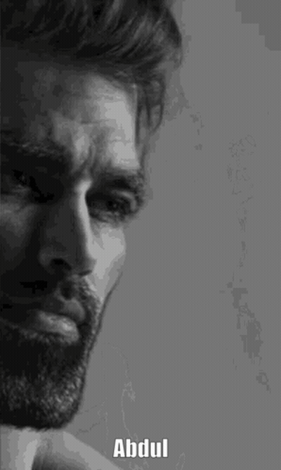 A Black And White Photo Of A Man With A Beard And The Name Abdul Written On His Face . GIF