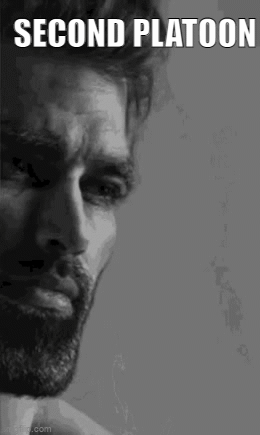 A Black And White Photo Of A Man With A Beard And The Words `` Second Platoon '' On The Bottom . GIF