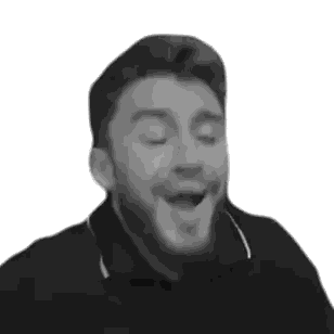 A Black And White Photo Of A Man With A Beard Making A Funny Face . Sticker