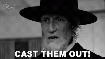 A Black And White Photo Of A Man With A Beard Wearing A Hat . GIF