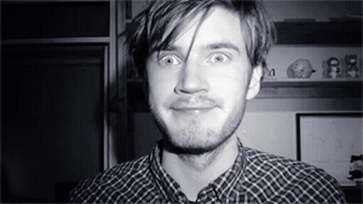 A Black And White Photo Of A Man With A Beard GIF