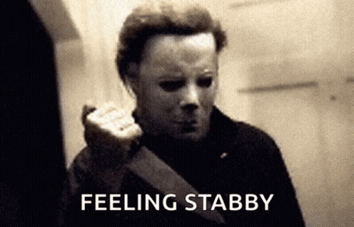 A Black And White Photo Of A Man With A Mask And The Words Feeling Stabby GIF