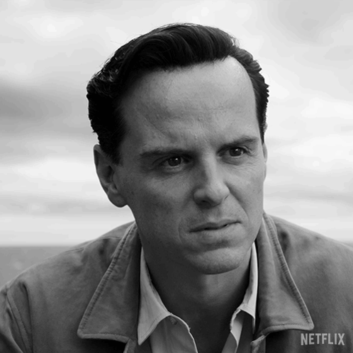 A Black And White Photo Of A Man With A Netflix Logo On The Bottom GIF