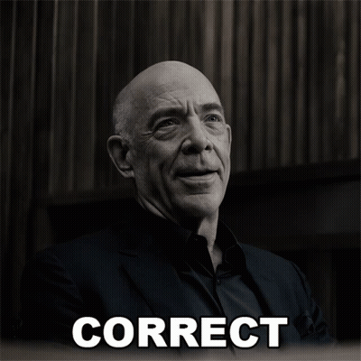 A Black And White Photo Of A Man With Correct Written In White GIF