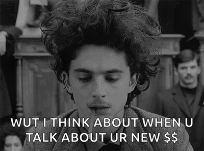 A Black And White Photo Of A Man With Curly Hair Saying Wut I Think About When U Talk About Ur New $ GIF