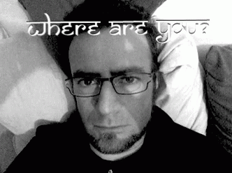 A Black And White Photo Of A Man With Glasses And The Words Where Are You On The Bottom GIF