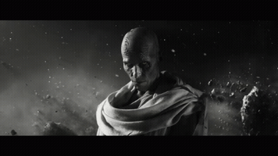 A Black And White Photo Of A Man With Glowing Red Eyes GIF
