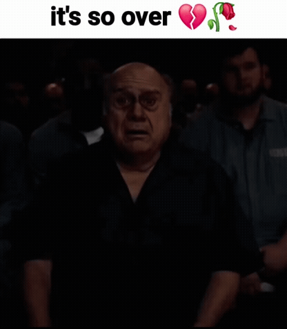 A Black And White Photo Of A Man With His Hands Folded And The Words It 'S So Over Above Him GIF