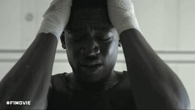 A Black And White Photo Of A Man With His Hands On His Head With The Hashtag #Fimovie GIF