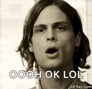 A Black And White Photo Of A Man With His Mouth Open And The Words `` Ooh Ok Lol '' Written On His Face . GIF