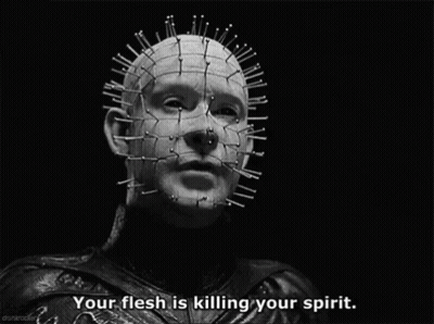 A Black And White Photo Of A Man With Spikes On His Head And The Caption Your Flesh Is Killing Your Spirit GIF
