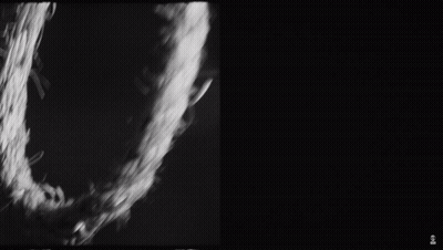 A Black And White Photo Of A Man With Tattoos Covering His Eyes GIF