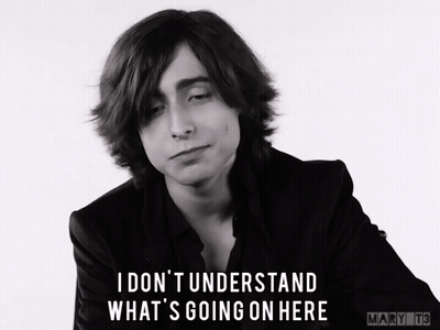 A Black And White Photo Of A Man With The Caption I Don T Understand What 'S Going On Here GIF