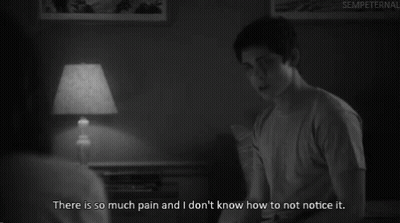 A Black And White Photo Of A Man With The Caption " There Is So Much Pain And I Don T Know How To Not Notice It GIF
