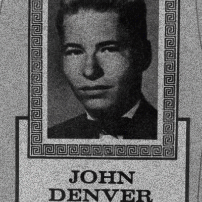 A Black And White Photo Of A Man With The Name John Denver On The Bottom GIF