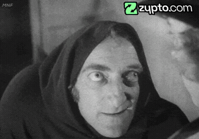 A Black And White Photo Of A Man With The Website Zupto.com At The Top GIF