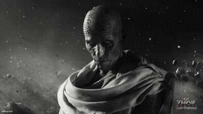 A Black And White Photo Of A Man With The Word Thor On The Bottom GIF