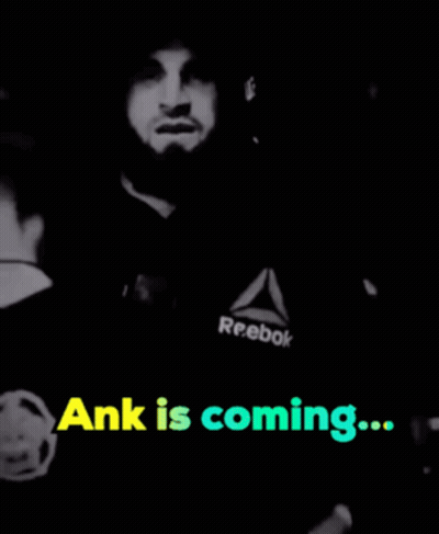 A Black And White Photo Of A Man With The Words " Ank Is Coming " GIF