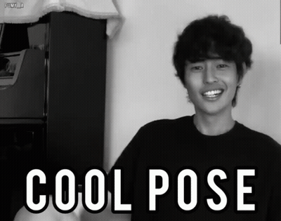 A Black And White Photo Of A Man With The Words Cool Pose Behind Him GIF