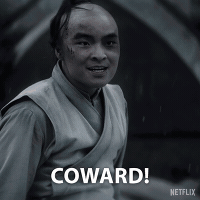 A Black And White Photo Of A Man With The Words Coward Written Below Him GIF
