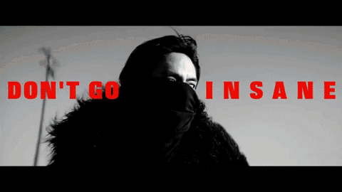 A Black And White Photo Of A Man With The Words Do N't Go Insane In Red GIF