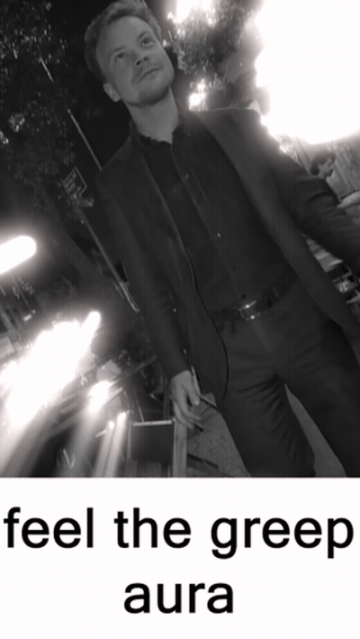 A Black And White Photo Of A Man With The Words Feel The Greep Aura GIF