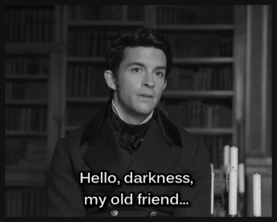 A Black And White Photo Of A Man With The Words Hello Darkness My Old Friend GIF