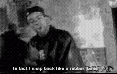 A Black And White Photo Of A Man With The Words `` In Fact I Snap Back Like A Rubber Band '' Written Below Him . GIF
