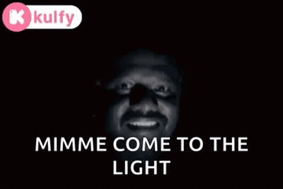 A Black And White Photo Of A Man With The Words " Mime Come To The Light " On The Bottom GIF